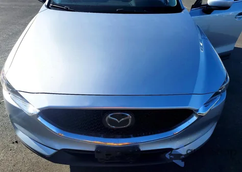 2021 Mazda Cx-5 Touring z USA, uszkodzony, nr VIN JM3KFBCM5M1307043